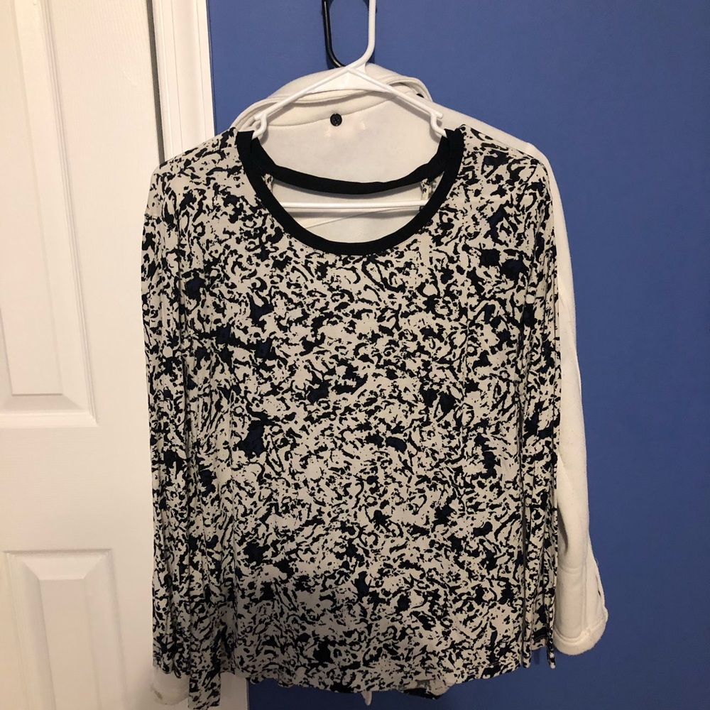 Calvin Klein black and white patterned top with cut out in the back